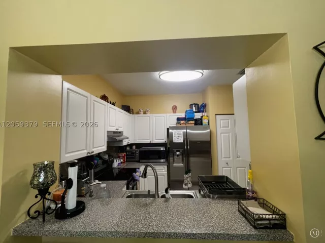 Продажа дома по адресу 904 NW 100th Ave - фото 9356396