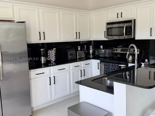 Продажа дома по адресу 1017 NE 208th St - фото 8947613