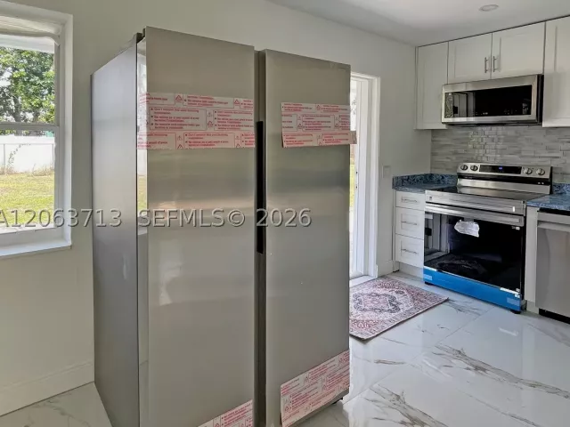 Продажа дома по адресу 1606 NW 12th Ave - фото 9034257