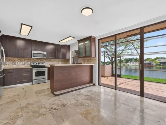 Продажа дома по адресу 1217 NW 122nd Ter - фото 9035356