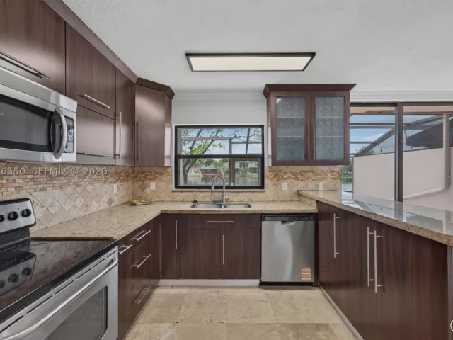 Продажа дома по адресу 1217 NW 122nd Ter - фото 9035357