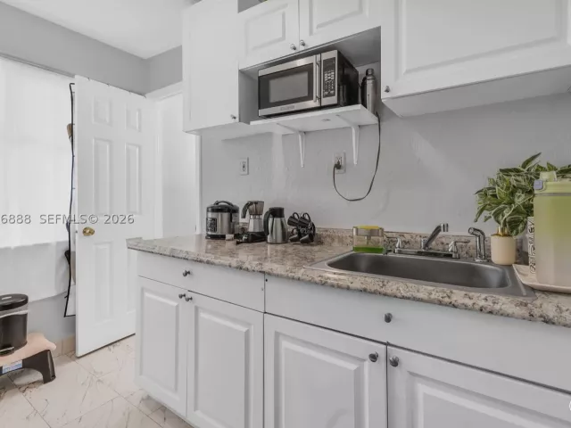 Продажа дома по адресу 1490 NE 151st Ter - фото 9065900