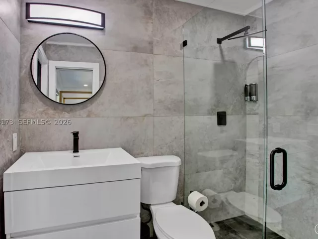 Продажа дома по адресу 2457 NE 27th Ter - фото 9279803