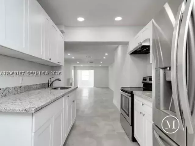 Продажа дома по адресу 460 NW 82nd Ter - фото 9262343