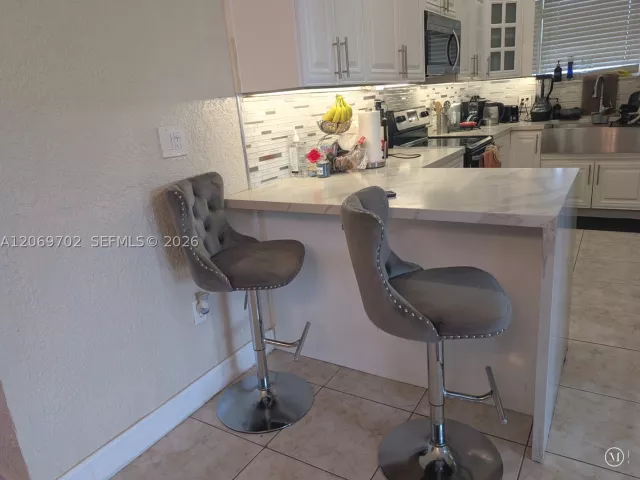 Продажа дома по адресу 560 NW 184th Ter - фото 9266796