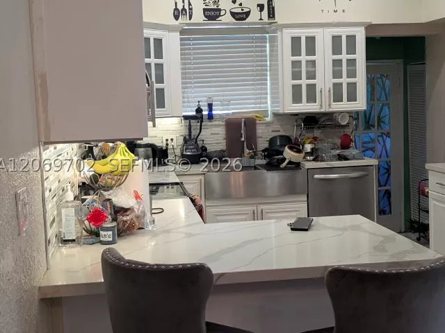 Продажа дома по адресу 560 NW 184th Ter - фото 9266797