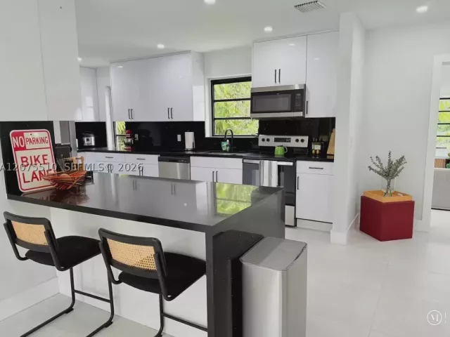 Продажа дома по адресу 119 NW 85 ST - фото 9370885