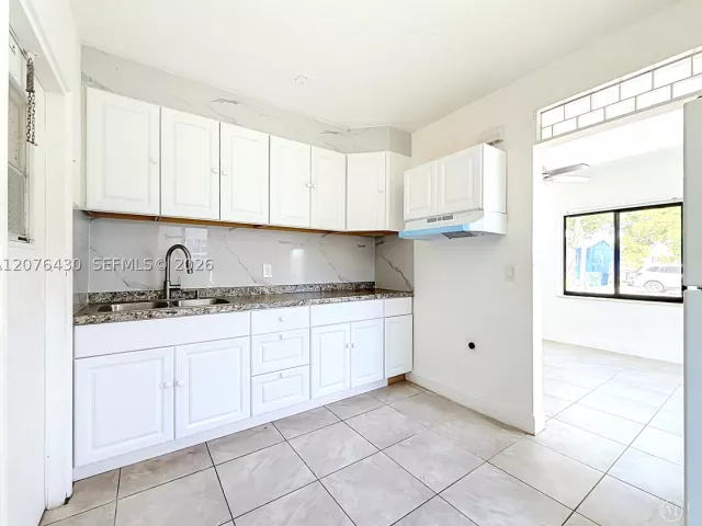 Продажа дома по адресу 230 NW 56th Ct - фото 9380635