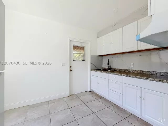 Продажа дома по адресу 230 NW 56th Ct - фото 9380636