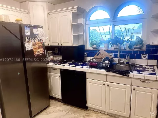 Продажа дома по адресу 3351 NW 20th St - фото 9383854