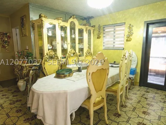 Продажа дома по адресу 8210 NW 34th Ave - фото 9389515